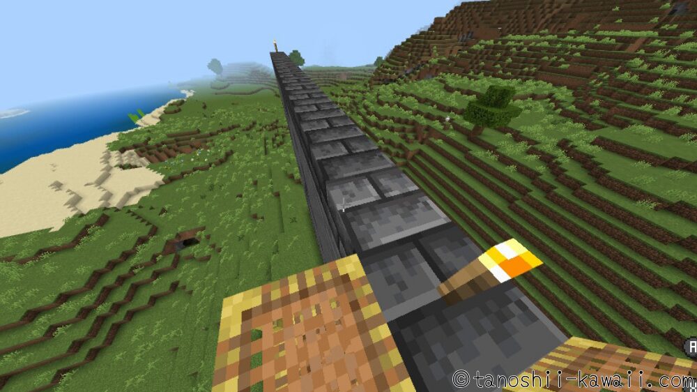 枠の上にたいまつを置く