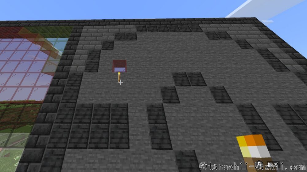 石Ver.の裏のガラスの下にたいまつを置く